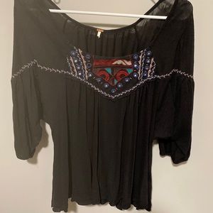 Free people size small embroidered top can also fit medium